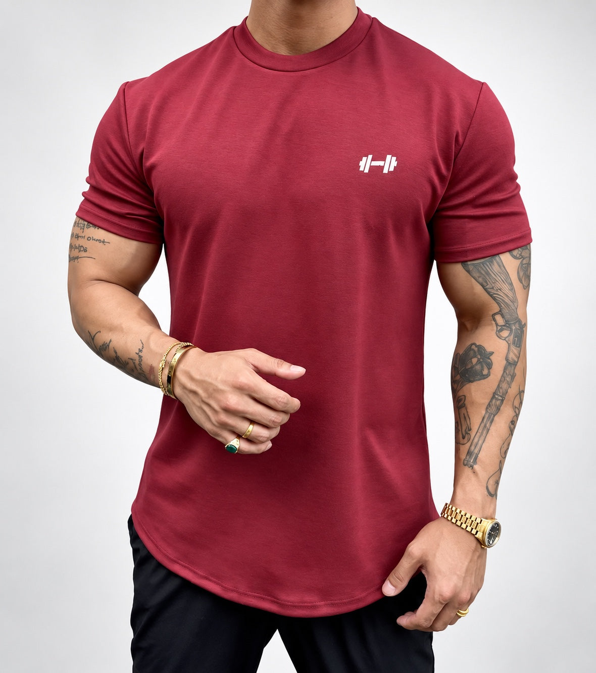 The Sweat District Performance Tee in burgundy — AI development garment visualization