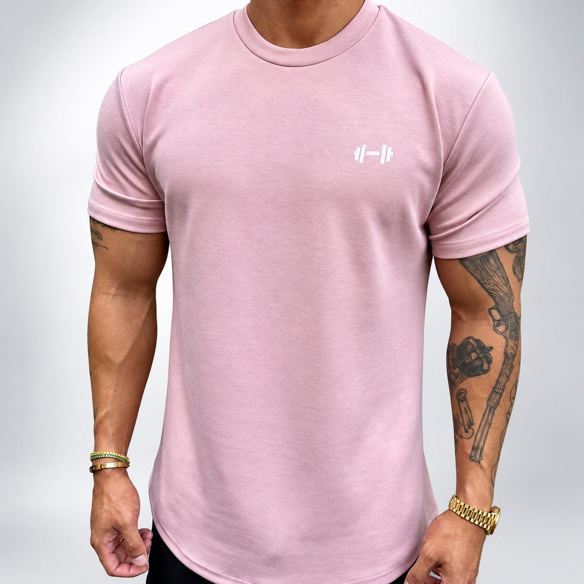 The Sweat District Performance Tee in Coral (pale dusty pink) — AI development garment visualization