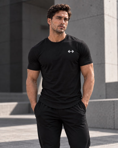 Black Form Muscle Tee, front fit view showing the chest, sleeves and curved hem.
